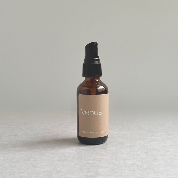 Species by the Thousands Venus Aromatherapy Mist in amber glass bottle with beige minimal label.