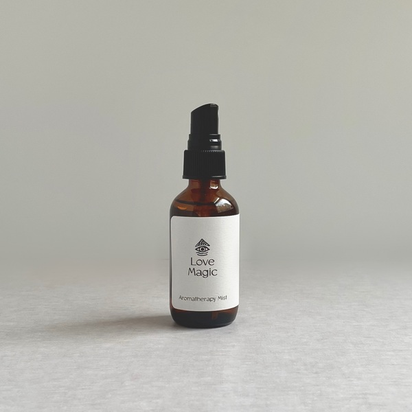 Species by the Thousands Love Magic Aromatherapy Spray amber glass with white minimal label.