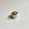 Species by the Thousands wide band River ring in brass.